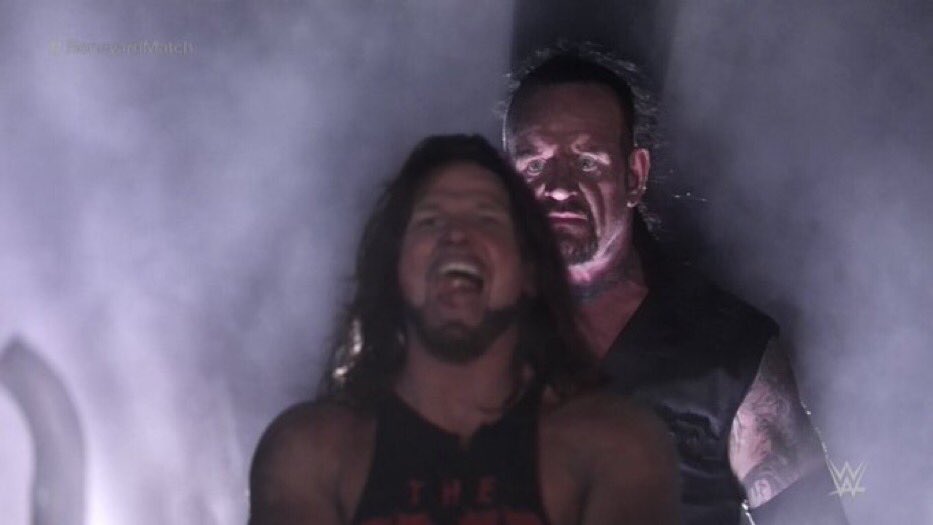 Undertaker Standing Behind AJ Styles Meme Template